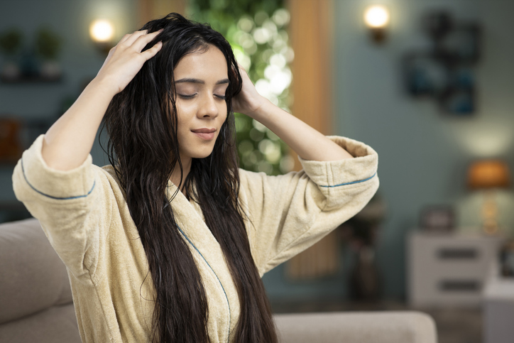 Young Woman hair care,